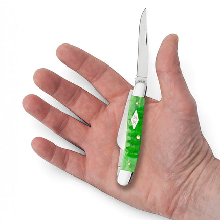 Razor Sharp AZ Case Gator Jigged bright green bone medium stockman pocket knife held in a palm.