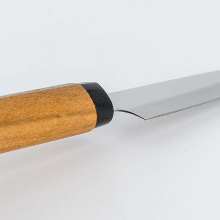 Razor Sharp AZ Japanese paring knife with a sharp point blade and natural wild cherry wood handle.