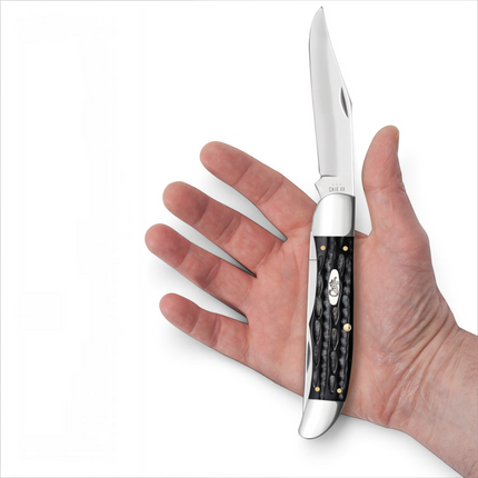 Razor Sharp AZ Case Jigged Buffalo Horn folding hunter knife with a mirror-polished stainless steel clip blade.