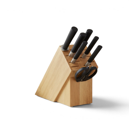 Razor Sharp AZ KAI Wasabi knife block set with stainless steel blades and black handles on a kitchen countertop