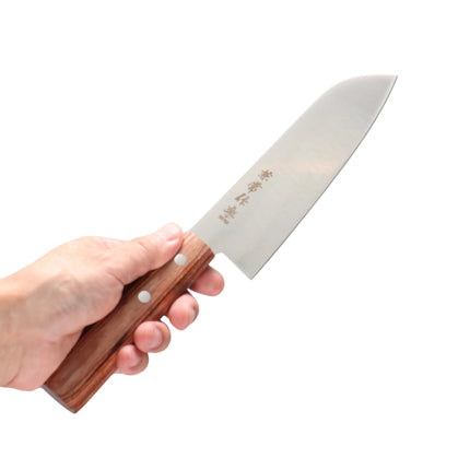 Razor Sharp AZ Kanetsune Santoku knife with a DSR-1K6 stainless steel blade and a light brown wood handle in hand