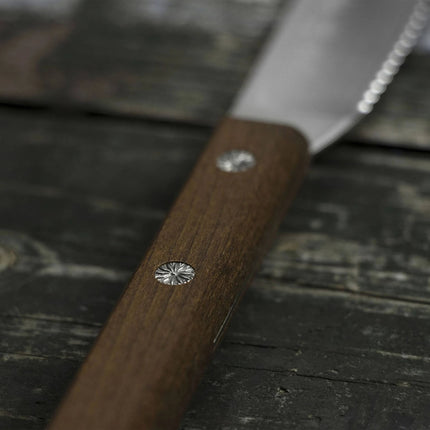 Razor Sharp AZ Kanetsune spread knife with a serrated stainless steel blade and a durable Kebony maple wood handle.