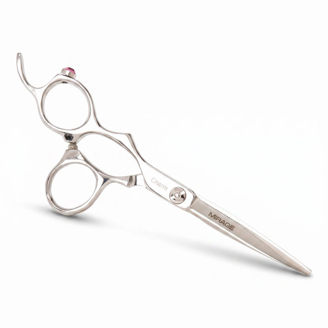 Razor Sharp AZ Mirage Charm left-handed hair cutting shears in silver stainless steel with a decorative pink charm.