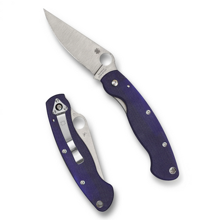 Razor Sharp AZ Military 2 folding knife with a CPM S110V steel blade and dark blue textured G-10 handle scales.