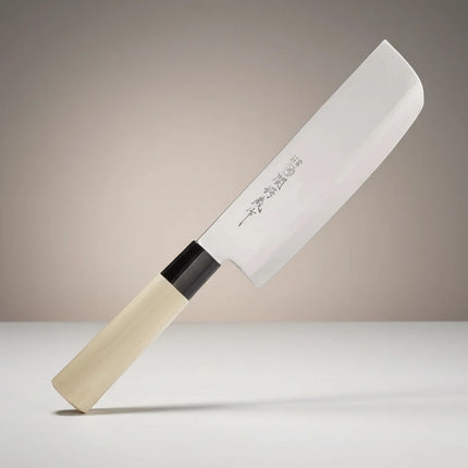 Razor Sharp AZ Due Cigni Nakiri knife with white blade and light maple wood handle, black bolster.