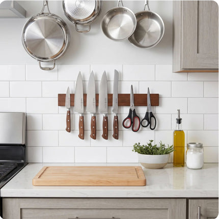 Razor Sharp AZ oak wood magnetic knife block mounted on a white tiled kitchen wall holding various knives and scissors
