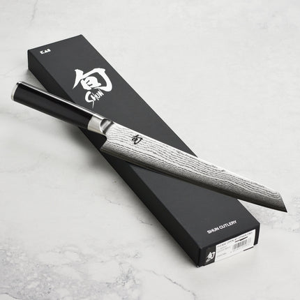 Razor Sharp AZ Shun Classic 9" Master Prep Knife with Damascus blade and ebony PakkaWood handle.