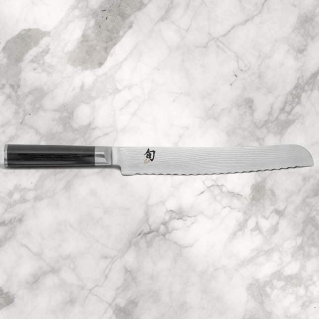 Razor Sharp AZ Shun Classic 9-inch serrated bread knife with Damascus steel blade and black ebony PakkaWood handle