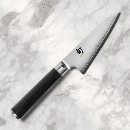 Razor Sharp AZ Shun Classic 4.5-inch Honesuki poultry knife with Damascus steel blade and black PakkaWood handle.