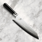 Razor Sharp AZ Shun Classic 8-inch Kiritsuke knife with a Damascus steel blade and black ebony PakkaWood handle.