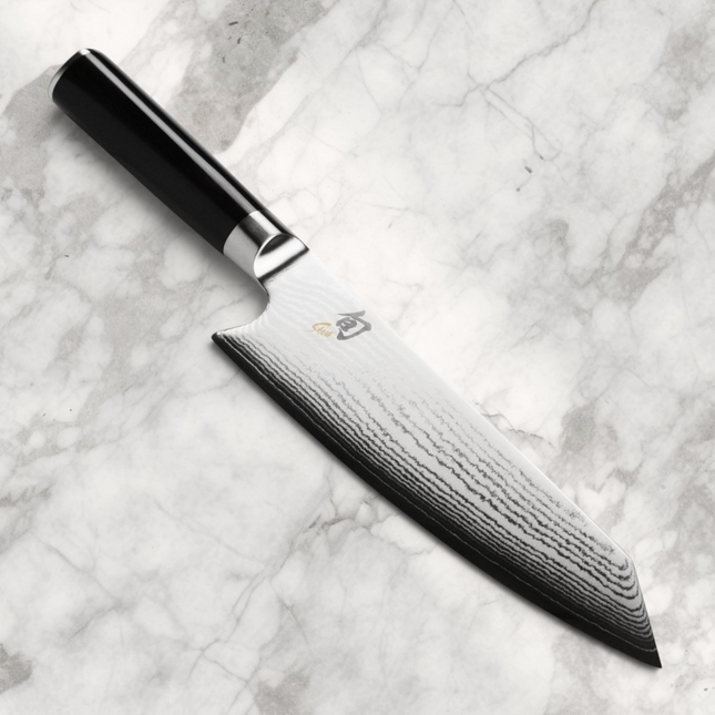 Razor Sharp AZ Shun Classic 8-inch Kiritsuke knife with Damascus steel blade and black D-shaped PakkaWood handle.