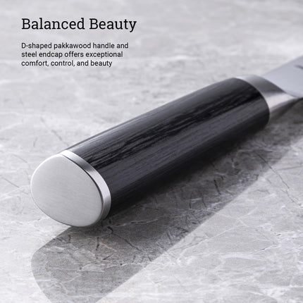 Razor Sharp AZ Shun Classic boning knife featuring a black D-shaped ebony PakkaWood handle with a steel endcap.