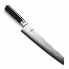 Razor Sharp AZ Shun Classic 9-inch master prep knife with Damascus steel blade and black D-shaped PakkaWood handle.