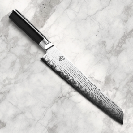 Razor Sharp AZ Shun Classic 9" Master Prep Knife with Damascus blade and black PakkaWood handle.