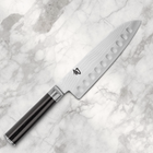 Razor Sharp AZ Shun Classic 7-inch hollow ground santoku knife with Damascus steel blade and black PakkaWood handle.