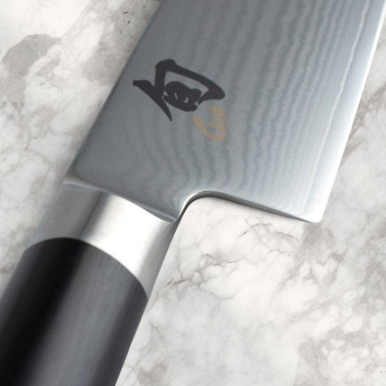 Razor Sharp AZ Shun Classic 6.5-inch master utility knife featuring a Damascus steel blade and ebony PakkaWood handle