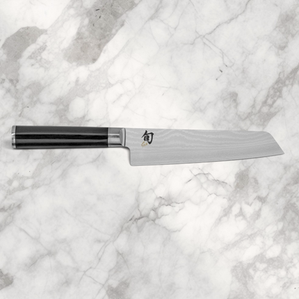 Razor Sharp AZ Shun Classic 6.5-inch master utility knife with Damascus steel blade and black ebony PakkaWood handle.