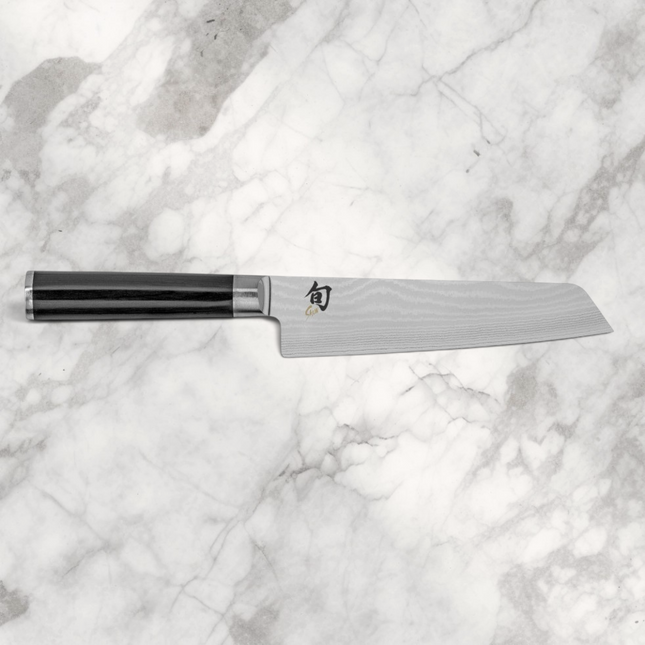 Razor Sharp AZ Shun Classic 6.5-inch master utility knife with Damascus steel blade and black ebony PakkaWood handle.
