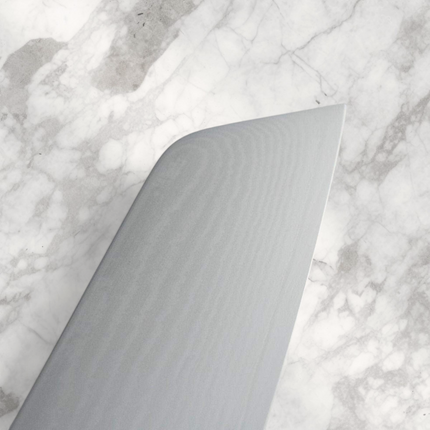 Razor Sharp AZ Shun Classic 6.5 inch master utility knife blade showing Damascus steel pattern and sharp tip