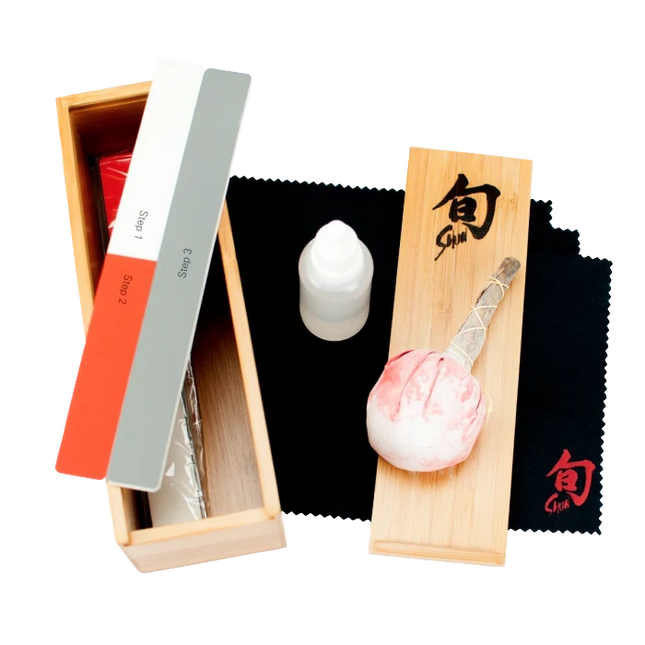 Razor Sharp AZ Shun Knife Care Kit with polishing cloths, sticks, oil, talc ball, and bamboo box.