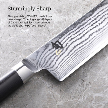 Razor Sharp AZ Shun Classic 6.5-inch Nakiri knife featuring a Damascus steel blade and black ebony PakkaWood handle.
