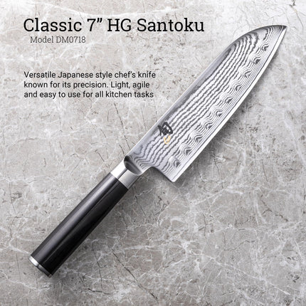 Razor Sharp AZ Shun Classic 7-inch hollow ground santoku knife with Damascus steel blade and black PakkaWood handle.
