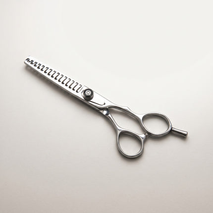 Razor Sharp AZ 6-inch 15-tooth texturizing shears made of Japanese Hitachi V-10 stainless steel with adjustable dial.