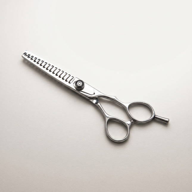 Razor Sharp AZ 6-inch 15-tooth texturizing shears made of Japanese Hitachi V-10 stainless steel with adjustable dial.