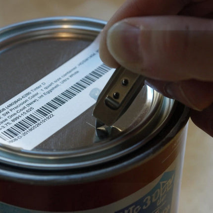 Razor Sharp AZ Ti-Pry titanium pocket tool being used to pry open a metal paint can lid
