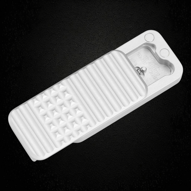 Razor Sharp AZ Rivery Zero V2 manual OTF utility knife in gray anodized aluminum with a gemstone milled pattern.