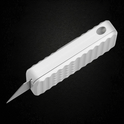 Razor Sharp AZ Rivery Zero V2 manual OTF utility knife in gray anodized aluminum with gemstone milling pattern