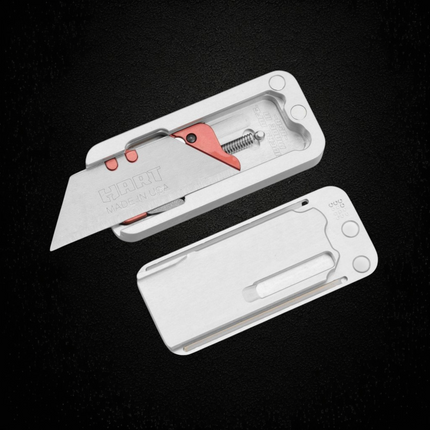 Razor Sharp AZ Rivery Zero V2 gray aluminum manual OTF utility knife with gemstone milling and replaceable blade.