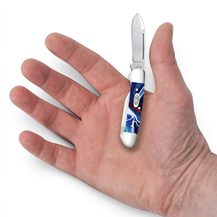 Razor Sharp AZ Case Baby Butterbean pocket knife with patriotic red, white, and blue Kirinite handle held in a hand