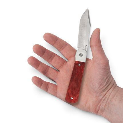 Razor Sharp AZ Case Longhouse knife with a Dymalux rosewood handle and stonewash satin CPM20CV clip blade in hand