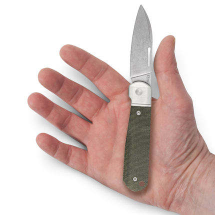 Razor Sharp AZ Case Highbanks knife with OD green canvas Micarta handle and stonewash Wharncliffe blade held in hand